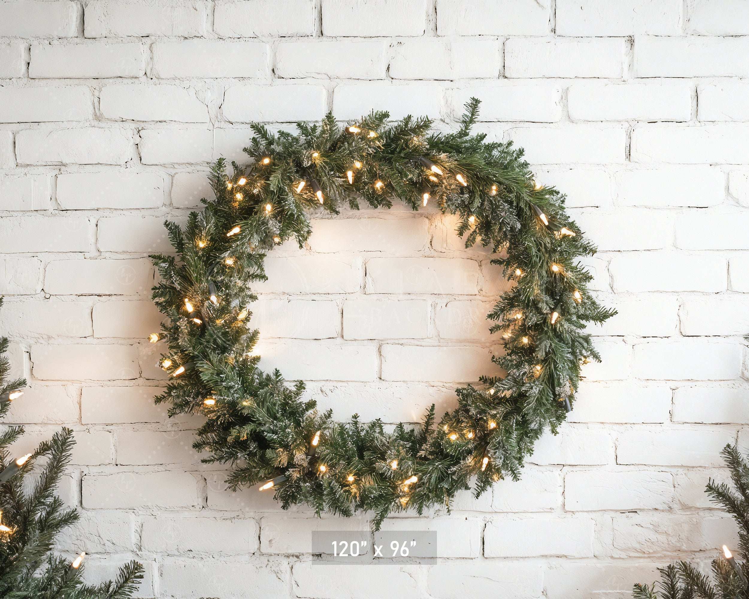 Lighted Wreath on White Brick Backdrop