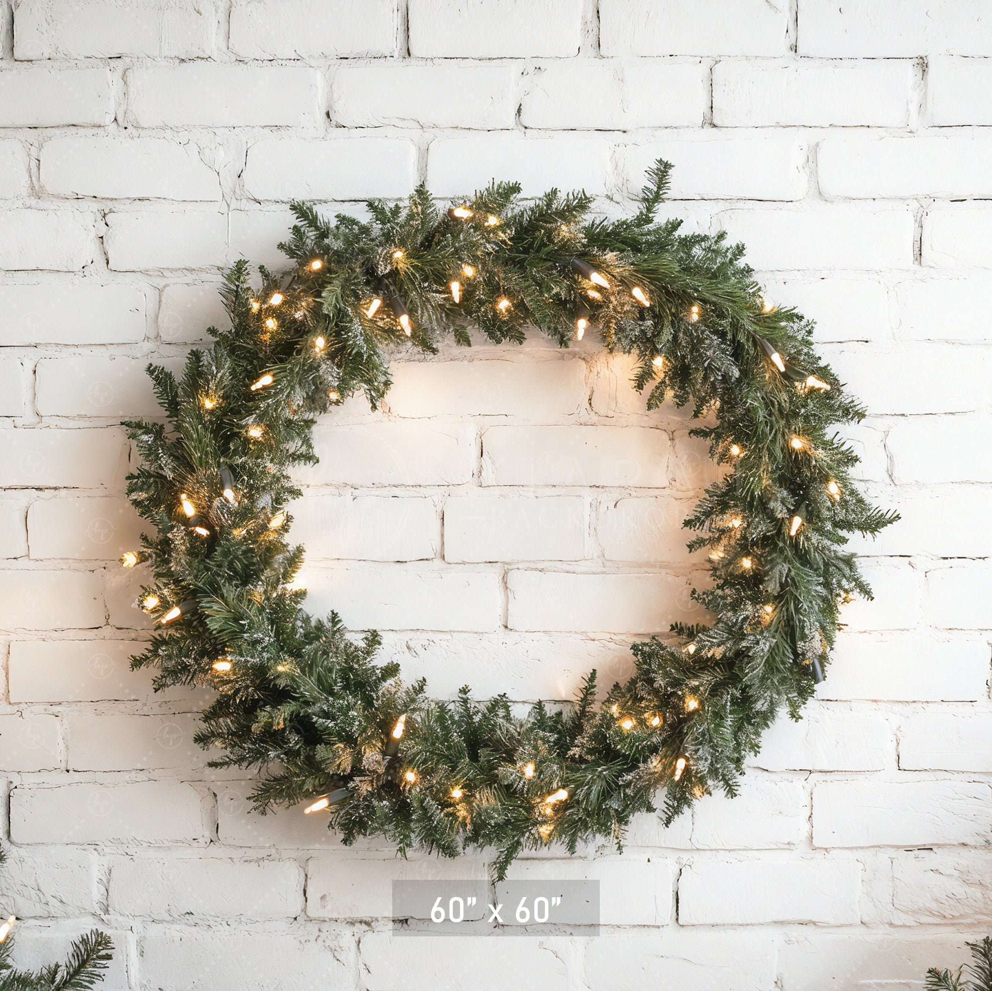 Lighted Wreath on White Brick Backdrop